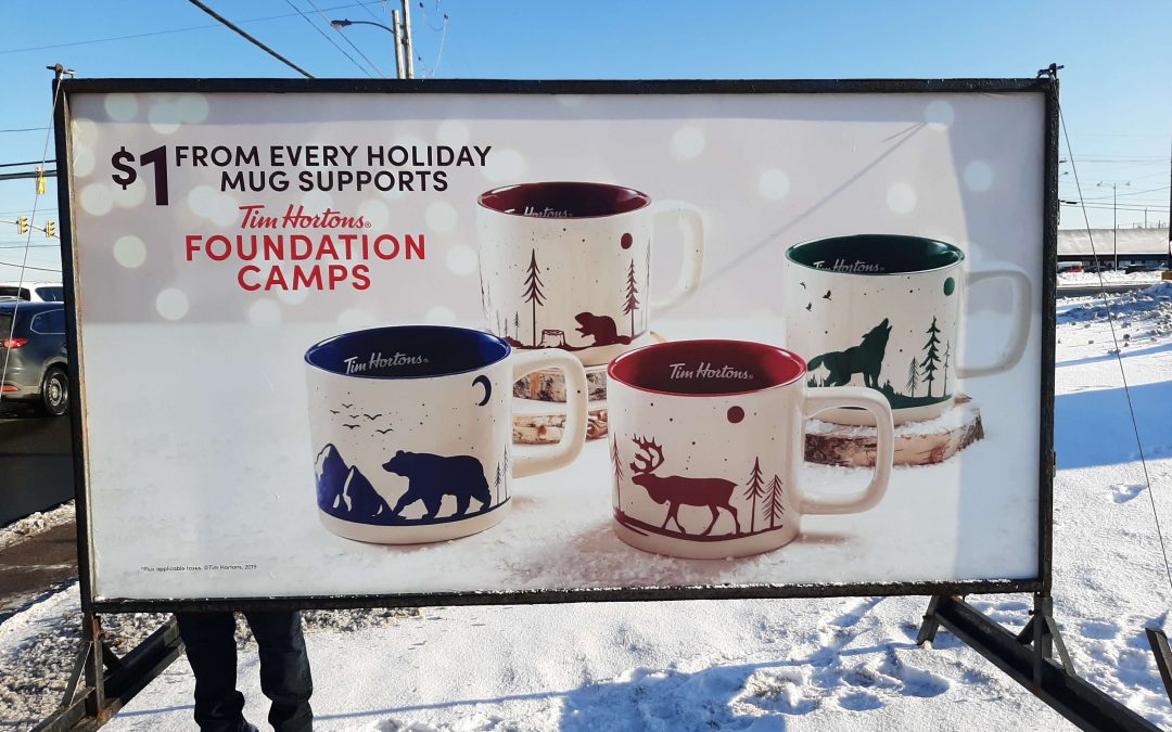 Tim Hortons foundation camps sign with mugs